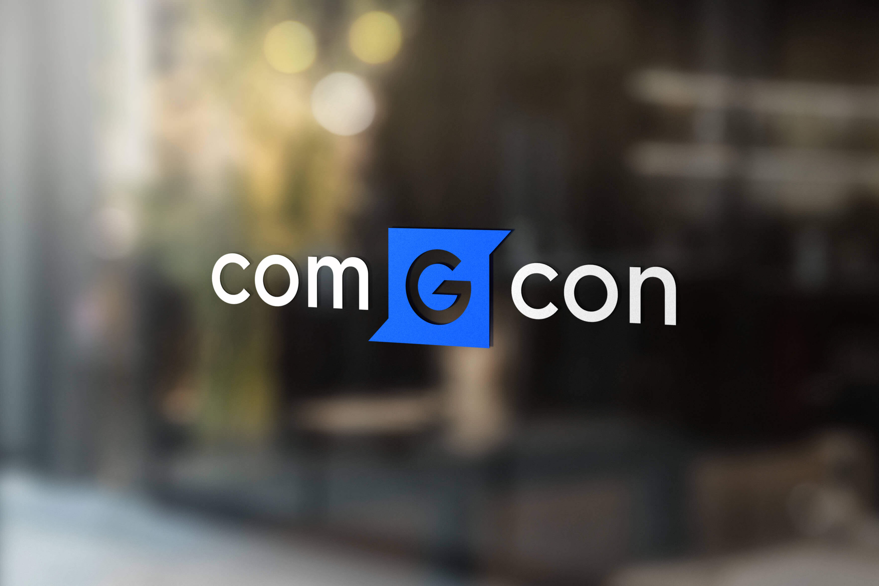 Com G Con logo på vindue