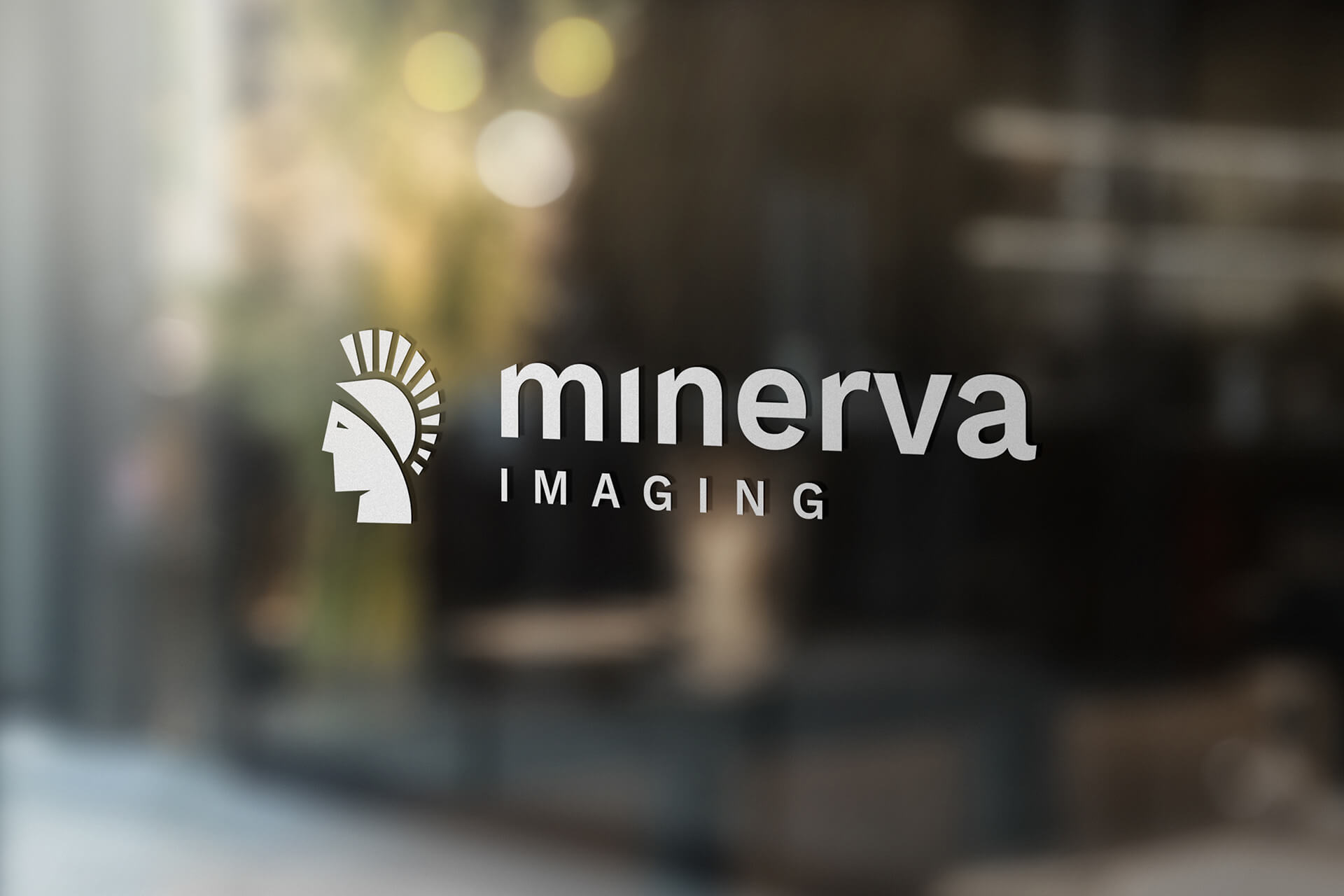 Minerva logo på vindue